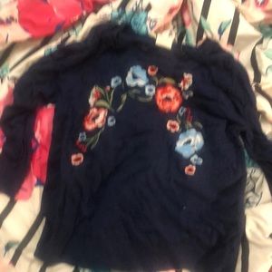 Blue sweater with flowers